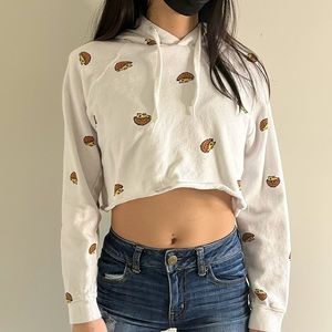 A crop hoodie with many hedgehogs on it